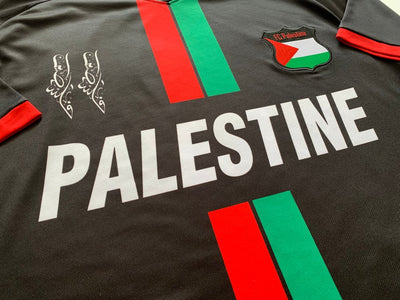 Maillot de football Palestine noir à rayures centrales (rouge/vert)