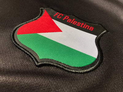 Maillot de football Palestine noir à rayures centrales (rouge/vert)
